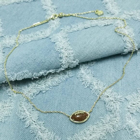 Kendra Scott Football Gold Orange Goldstone Short Pendant Necklace - Picture 2 of 3